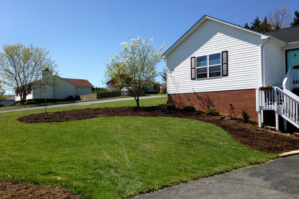 House with flower bed